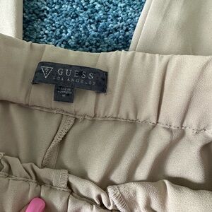 Guess Beige cargo pants. New w zipper on pockets